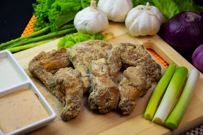 Garlic Parmesan Wings coated in savory garlic herb butter